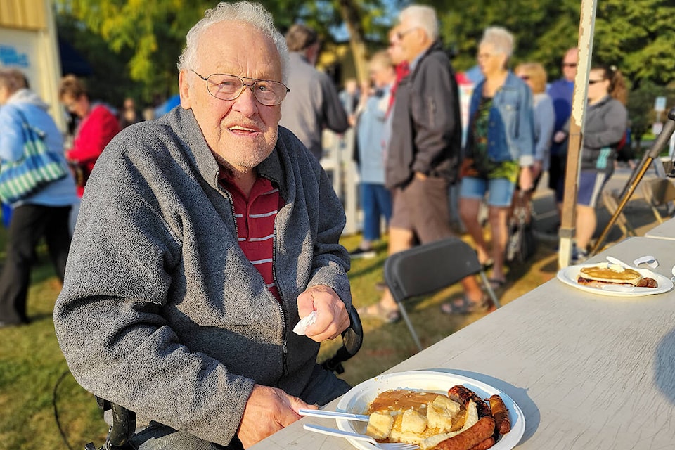 Gordon Smith, 85, was glad the Fort Langley Cranberry Fest was back to normal on Saturday, Oct. 8. The long-time resident has been attending the event since it started. (Dan Ferguson/Langley Advance Times)