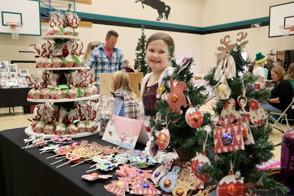 Emma Hazelton, 7 sold holiday decorations at the annual Langley Meadows craft fair, which took place at the Langley Meadows Community School on Saturday, Nov. 5. (Tanmay Ahluwalia/Langley Advance Times)