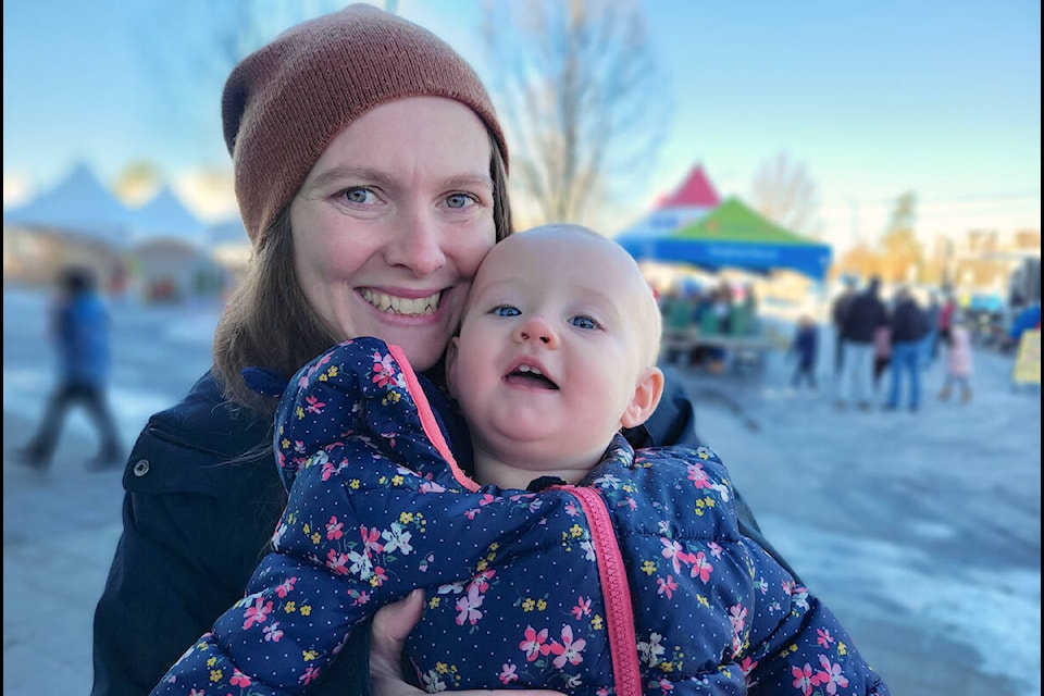 Ten-and-a half-month old Jubilee of Langley City was celebrating her very first Christmas with mom Christina Kamlade at the Magic of Christmas Festival held at Timms Centre in Langley City Dec. 3-4. (Dan Ferguson/Langley Advance Times)