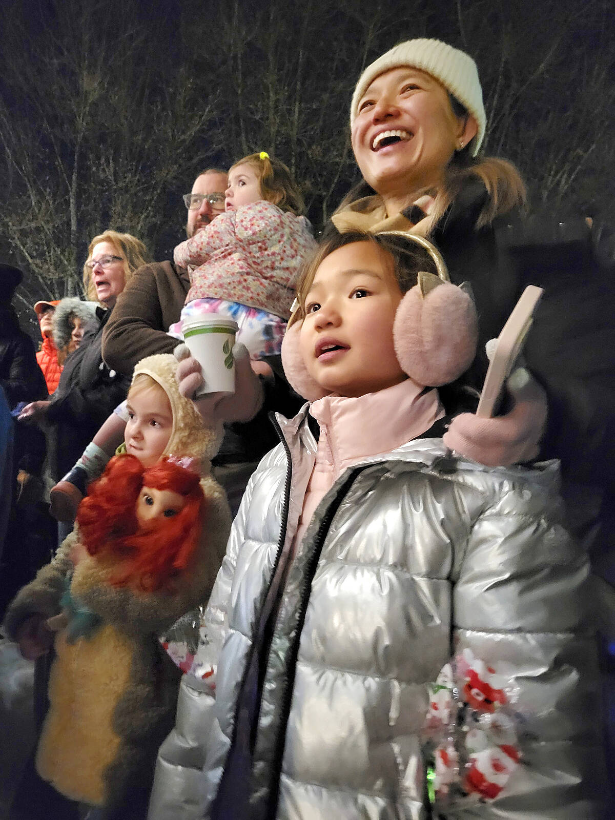Marla Wang and daughter Elly, 7, from Abbotsford, sang Christmas carols at the annual tree lighting at the historic Fort Langley community hall on Saturday, Dec. 3. (Dan Ferguson/Langley Advance Times)