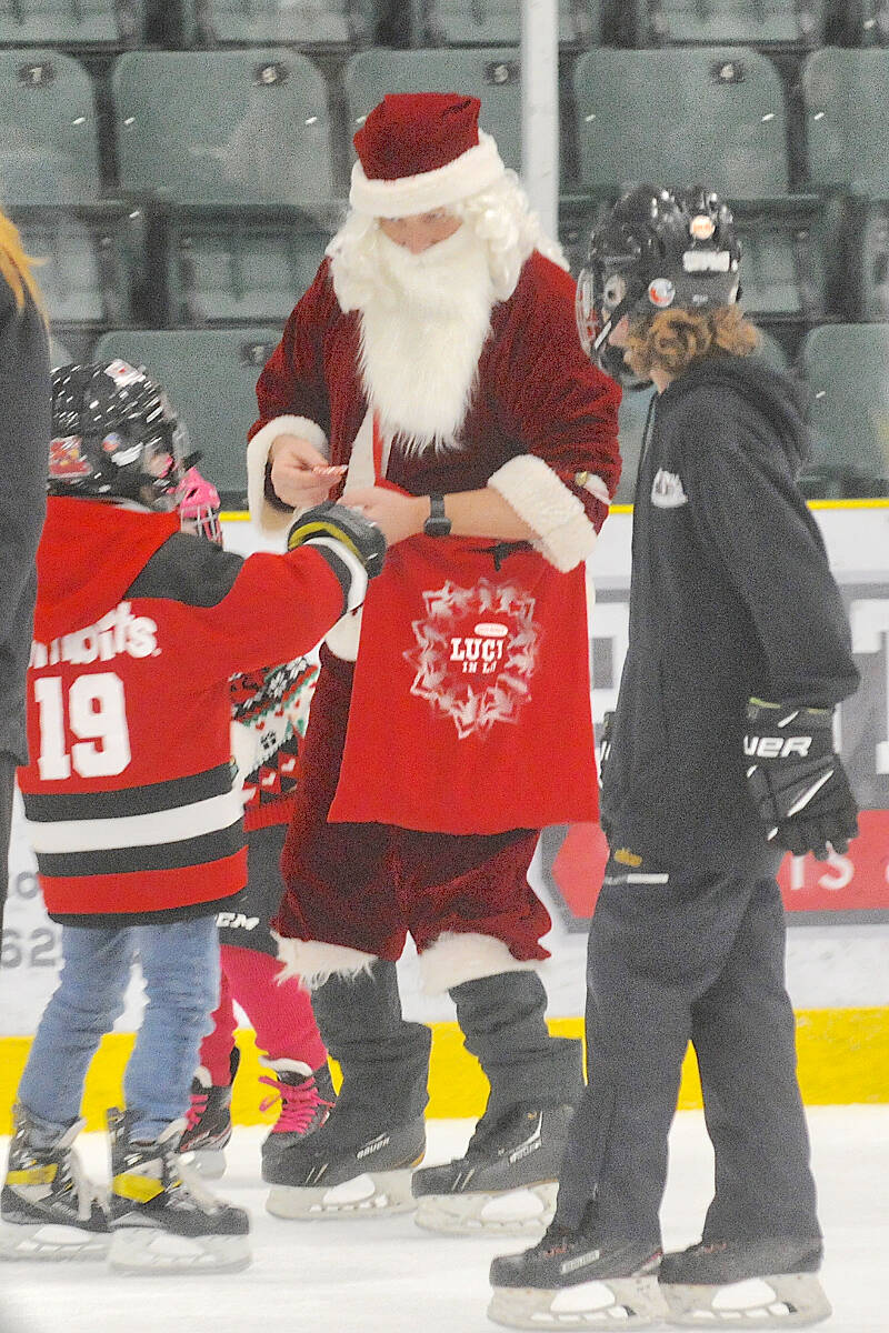 Young skaters had an early encounter with the jolly old elf at the Dec. 11 Santa Skate organized by Langley Minor Hockey Association at George Preston arena. (Dan Ferguson/Langley Advance Times)