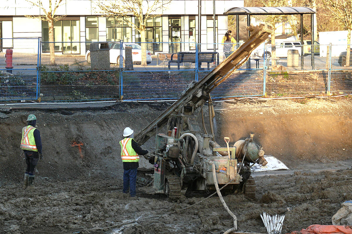 Workers were preparing the site of the foundation for the Alder Grove Town Centre project on Wednesday, Jan. 4. The first three yet-to-be-completed buildings are completely sold out. .(Dan Ferguson/Langley Advance Times)