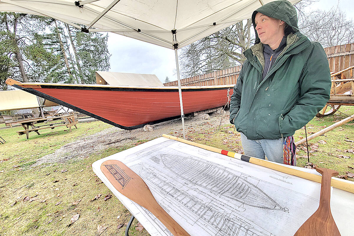 Patrick Calihou explained sourcing nails to build the authentic York boat behind him was a challenge. He was one of several presenters at Vive les Voyageurs at historic Fort Langley on Saturday, Jan. 21. (Dan Ferguson/Langley Advance Times)