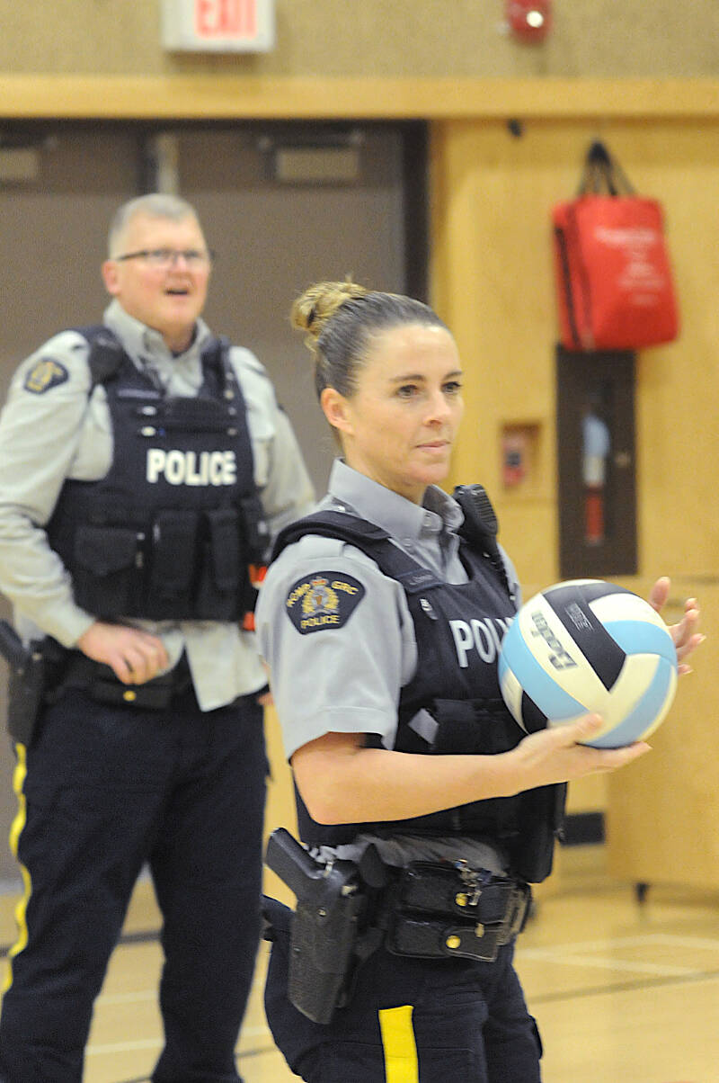 Langley RCMP officers and Yorkson Middle School teachers tangled in a friendly game of volleyball in the school gymnasium on Wednesday, Feb. 1. (Dan Ferguson/Langley Advance Times)