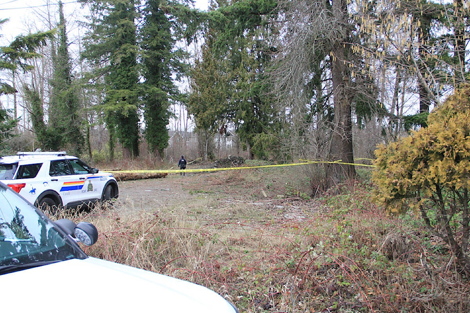 Surrey RCMP investigate Feb. 15, 2023, in the 19100-block of Fraser Highway in Clayton Heights after human remains were found in a wooded area. Mounties have now identified the man. (Photo: Malin Jordan)
