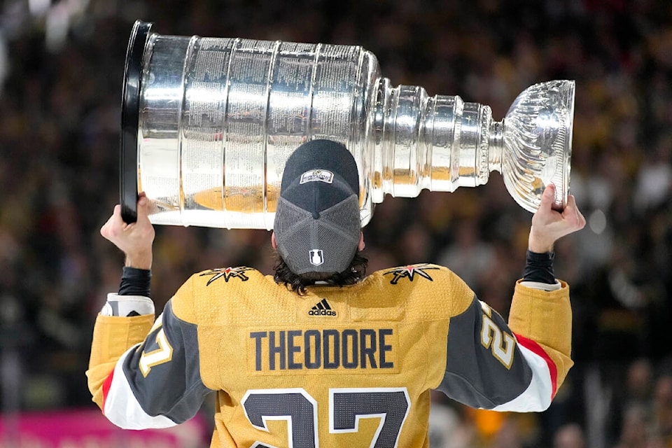 Vegas Golden Knights defenseman Shea Theodore skates with the Stanley Cup after the Knights defeated the Florida Panthers 9-3 in Game 5 of the NHL hockey Stanley Cup Finals Tuesday, June 13, in Las Vegas. The Knights won the series 4-1. (AP Photo/John Locher/Special to Black Press Media)