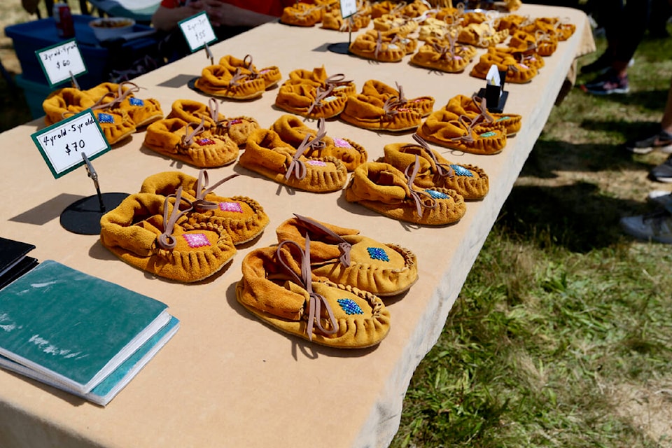 Children’s moccasins are displayed at a vendor booth Wednesday, June 21 during National Indigenous Peoples Day celebrations at Royal Roads University. (Justin Samanski-Langille/News Staff)