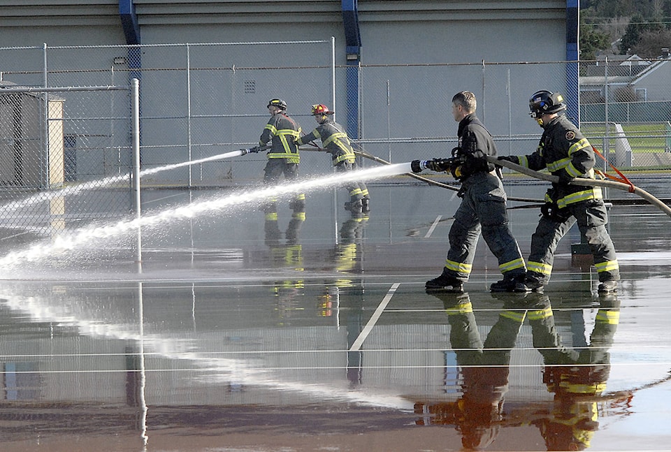11030652_web1_180209-pdn-firefighter-practice