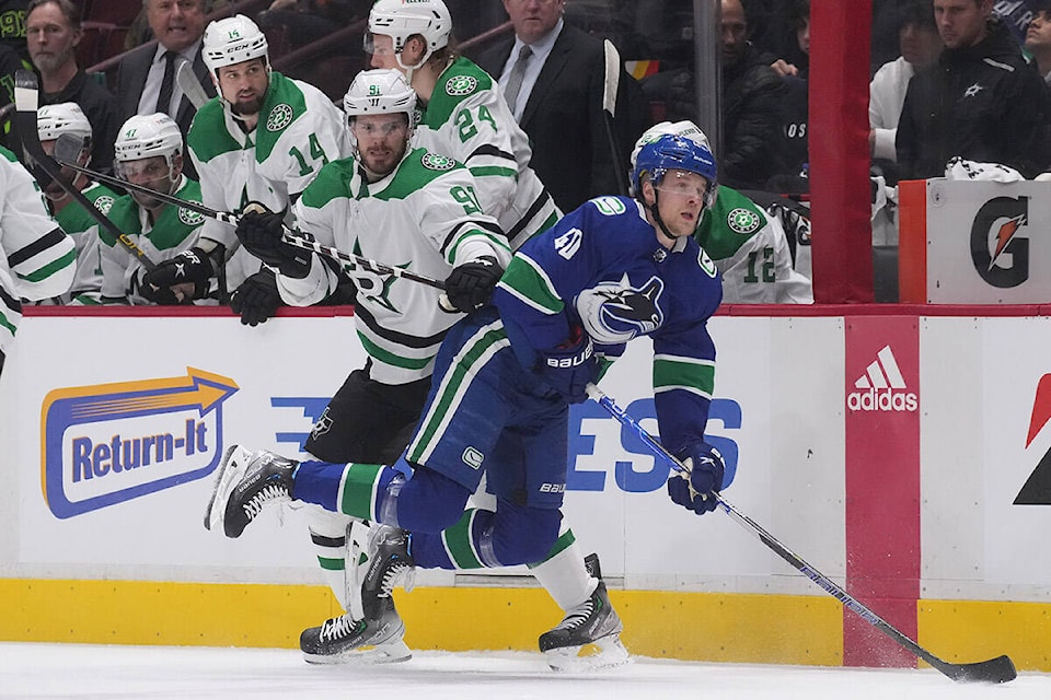 28840481_web1_220418-CPW-Stars-Canucks-canucks_1