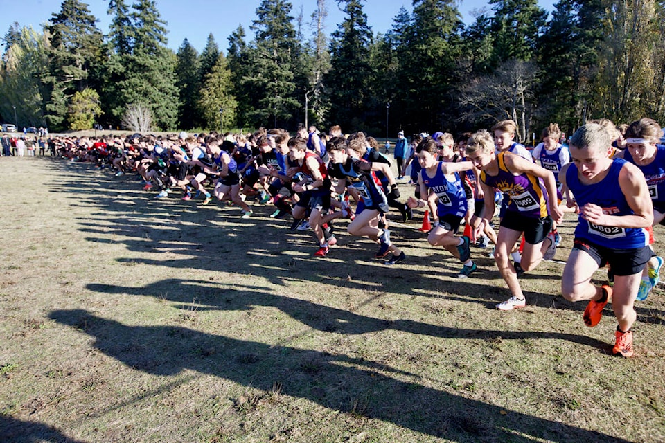 Racers in the junior boys event set off in a mass start Saturday (Nov. 5) during the B.C. High School Cross Country Championships, held at Royal Roads University. (Justin Samanski-Langille/News Staff)