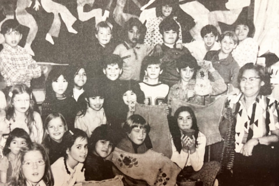 'Gives Indian Art Demonstration At Cache Creek School' (Dec. 4, 1974): 'Mrs. Anne Zabotel (r), councillor Bonaparte Village Band, is shown here telling pupils at the Cache Creek School of the crafts and cultures of her people.'