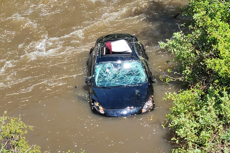 Mark and Janet Brimicombe were trapped inside their car after it plunged down an embankment into Hat Creek off Highway 99, and were rescued by two passers-by who have been commended for their bravery.