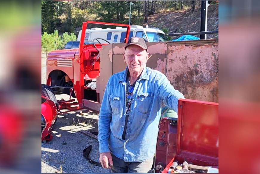 Huntley Smith pictured with Lytton's 1941 International Harvester fire truck, which he and other voliunteers are restoring.
