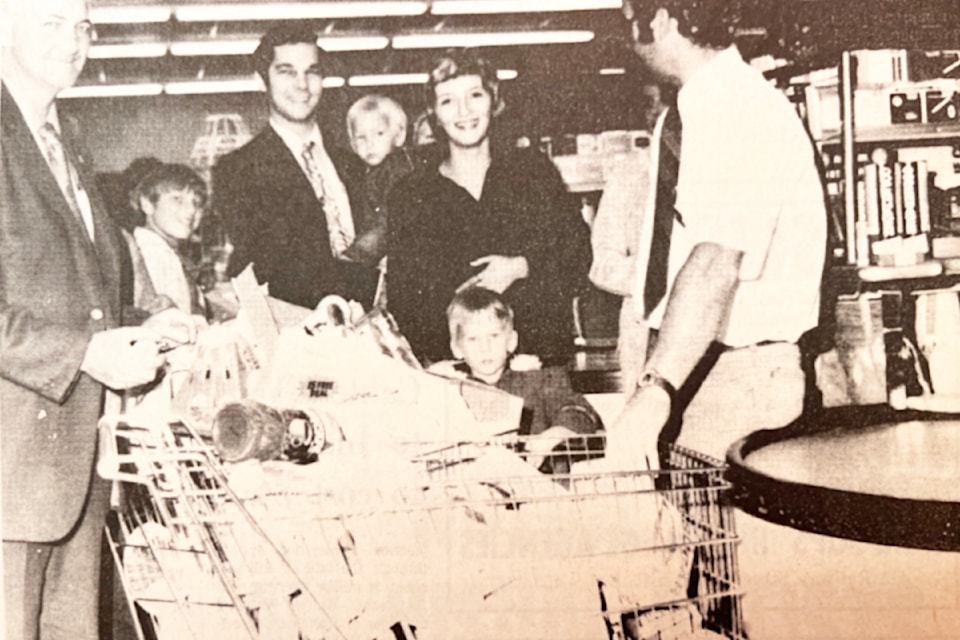 'Groceries Galore!' (Oct. 17, 1974): (l to r) Oscar Johansen, Mr. and Mrs. Rod Killduff and sons, and Ashcroft Safety Mart manager Laurie Haynes.'