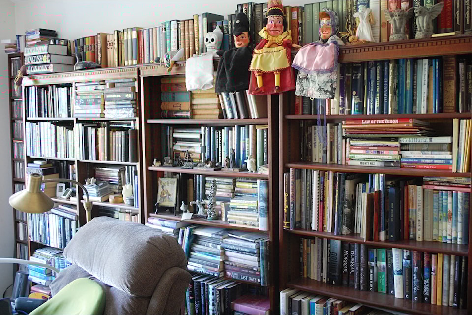 Books do furnish a room, and double-stacking helps with that.
