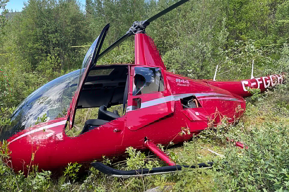 Four people were rescued from a helicopter that went down behind the Iron Horse Pub in Lone Butte, northwest of Kamloops, on Sunday, July 6.