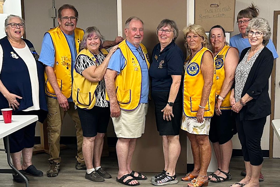 The new slate of directors for the Ashcroft and District Lions Club was inducted by Zone Chair Kim (l) in June. (from second l) President Lion George, Vice President Lion Donna, Past President and Treasurer Lion Gordon, Secretary Lion Sue, Director Lion Delila, Tail Twister Lion Darlene, and Lion Directors Janice and Jackie. (not pictured) Director Lions Ernie and Joanne and Lion Tamer Lion Darril.