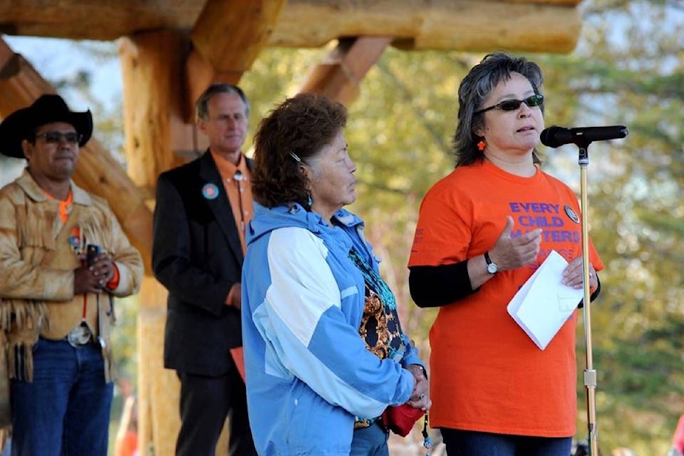 Phyllis Webstad (right), speaks at  Boitanio Park on Orange Shirt Day. (Tribune file photo)