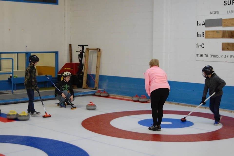 14625778_web1_181204-ACC-M-Curling-group