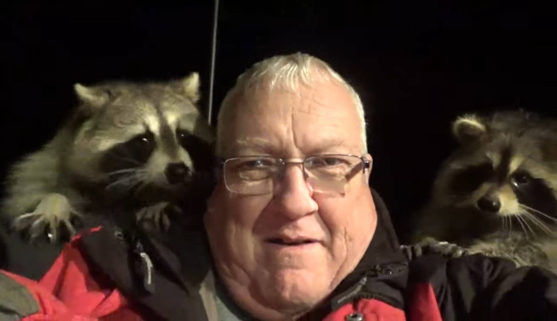 23316971_web1_201119-ACC-Editors-desk-RaccoonWhisperer_2