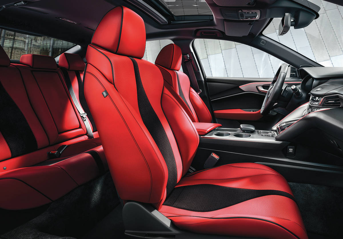 Although the red seats grab your attention first, try feasting your eyes on the artful centre stack that houses the arrangement of buttons that shift the standard 10-speed automatic transmission. PHOTO: ACURA