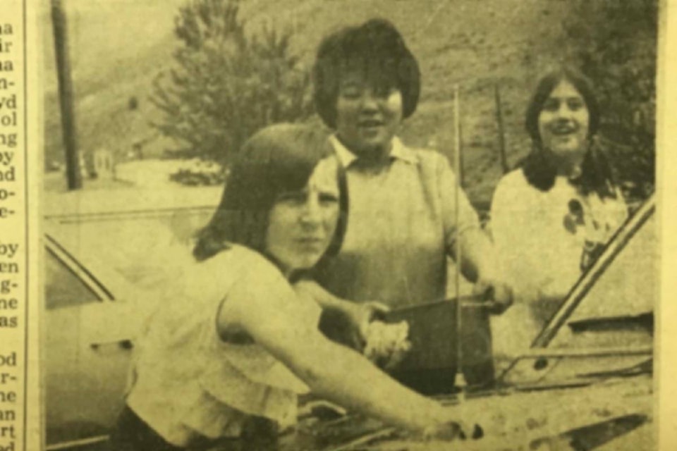 ‘A GOOD CLEAN JOB OF CAR WASHING AT CACHE CREEK: Here are (l to r) Janice Clark, Maryanne Nagata, teacher, and Sandra McAbee making a clean job at the students car wash recently.’ From the Ashcroft Journal , June 10, 1971. (Photo credit: Journal archives)