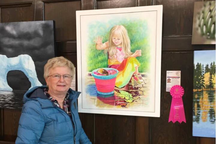 Loon Lake artist Janet Harman with her painting ‘Splashmaker’, which won first place in the ‘Emerging Artist: 2D’ category at the recent Art Exposed exhibit in Kamloops. (Photo credit: Submitted)