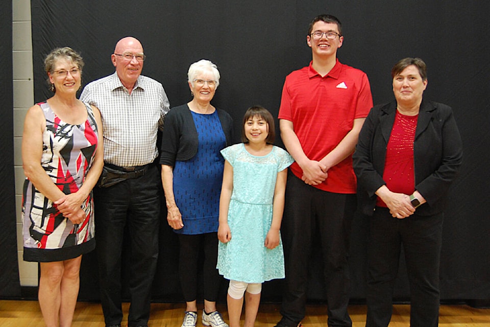(from l) 2021 Rotary Citizens of the Year Paulet Rice, Al Stott, Marijke Stott, Michaela Aie, Jacob Aie, and Pat Moyer. (Photo credit: Barbara Roden)