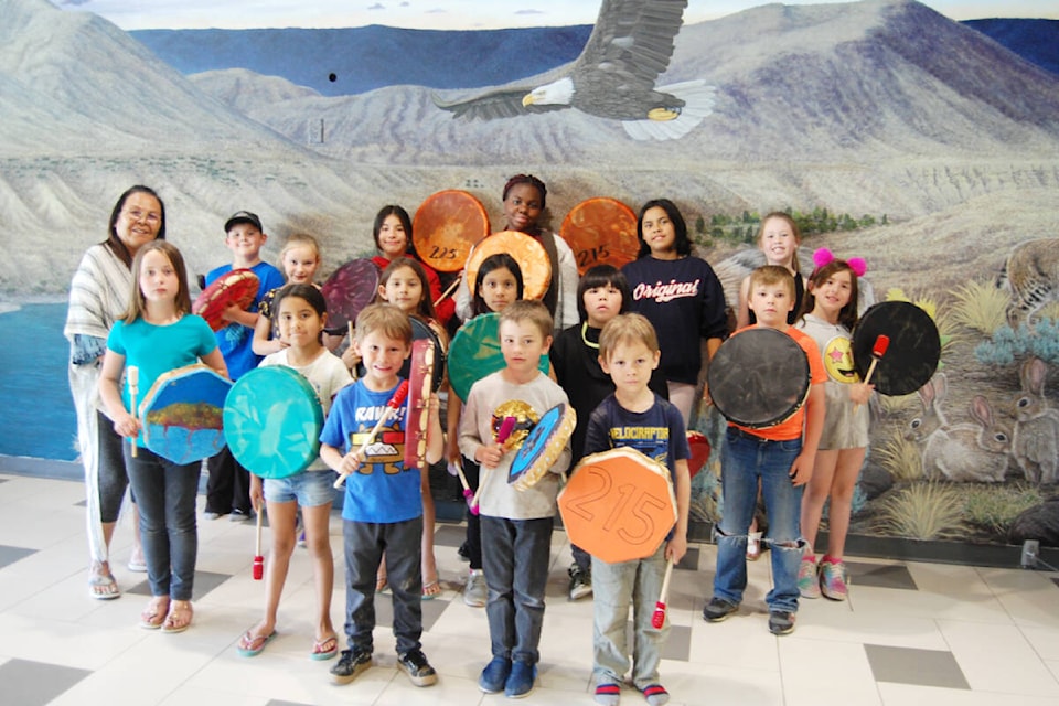 Some of the Huleme Rams Drummers from Desert Sands Community School in Ashcroft, with instructor Violet Cowley at far left. A video of the group performing the Secwepemc Welcome Song will be part of the Drum Across North & South America event on June 21. (Photo credit: Barbara Roden)