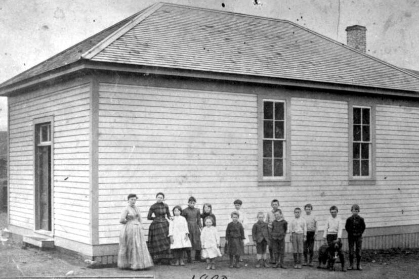 The second Ashcroft school, pictured around 1890. By 1897 the school was felt to be too small for the number of students, and the provincial government was petitioned for funds to add a second room. A new, larger school would not be built until 1899. (Photo credit: Ashcroft Museum and Archives)