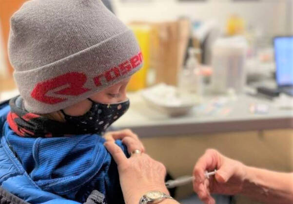 Families with a child younger than 12 only need to book one appointment in a 6-month to 11-year clinic, and the whole family can get their COVID and influenza vaccines at the same time. Photo courtesy Interior Health