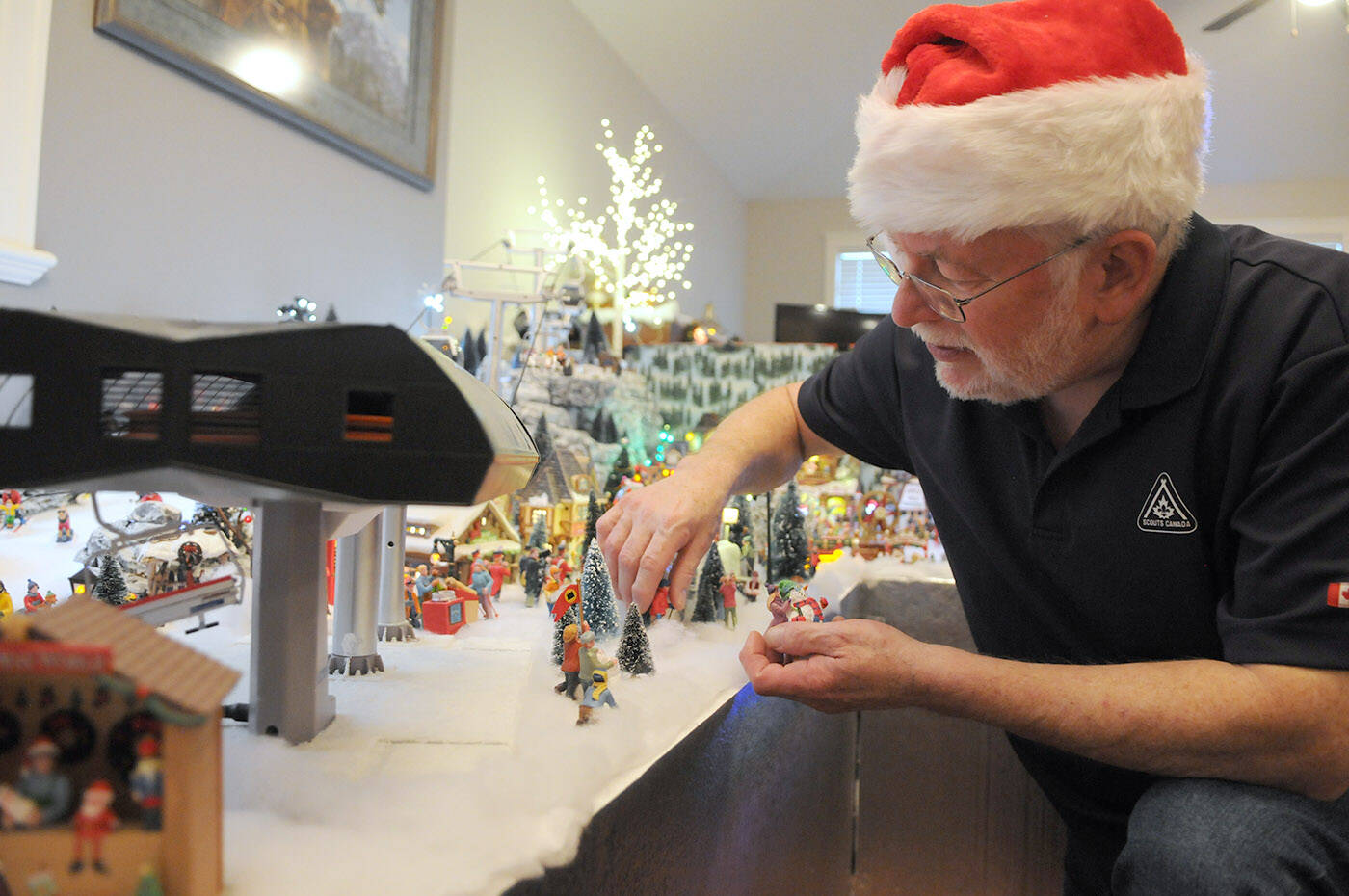 Terry Campbells display of Christmas miniatures takes up the entire living room of his Chilliwack home. He started the display in 2007 but it has been more challenging for him lately as hes been legally blind since 2018. (Jenna Hauck/ Chilliwack Progress)