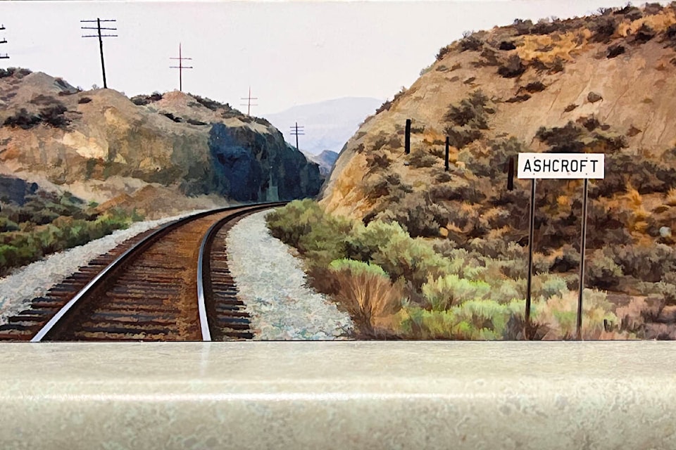 A work by Mike Walker in the author’s collection shows a mile board sign on the CP line west of Ashcroft, looking east towards town. Mile board signs like this are a mile out from station name signs on the CP network. (Photo credit: Barbara Roden)