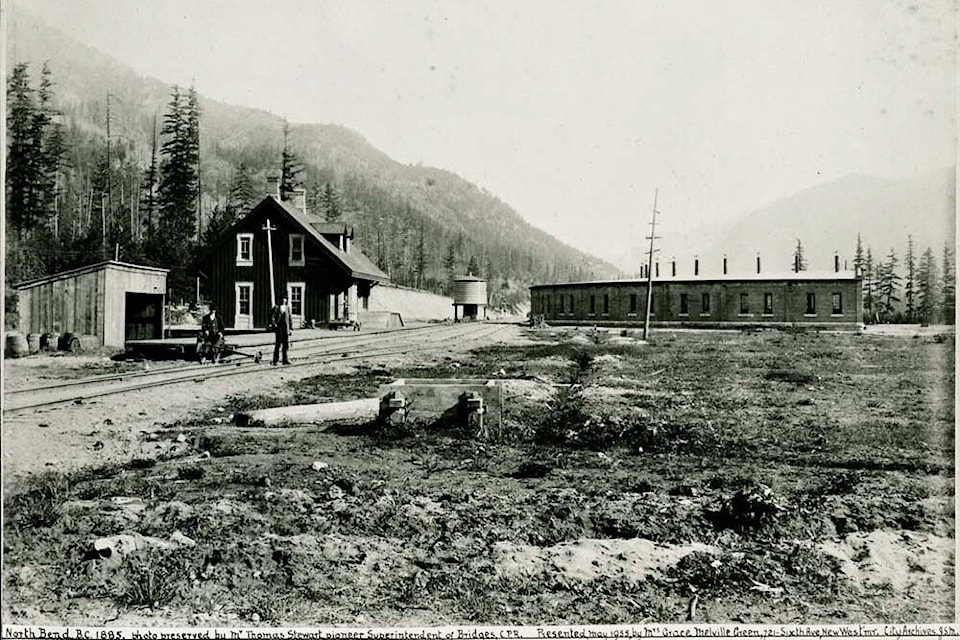 CP’s train station (with water tank!) and roundhouse at North Bend in 1885.