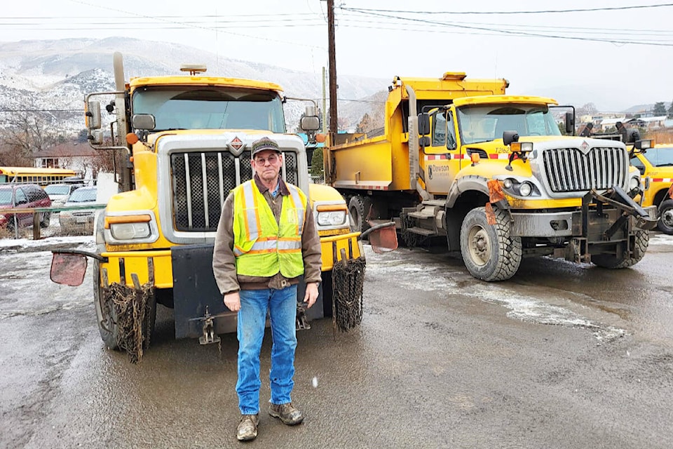 Dawson Road Maintenance employee Grant Gray at the Dawson yard in Ashcroft. While on duty plowing Loon Lake Road in December 2022, Gray helped rescue a motorist who had gone off the road into the lake. (Photo credit: Dawson Road Maintenance)