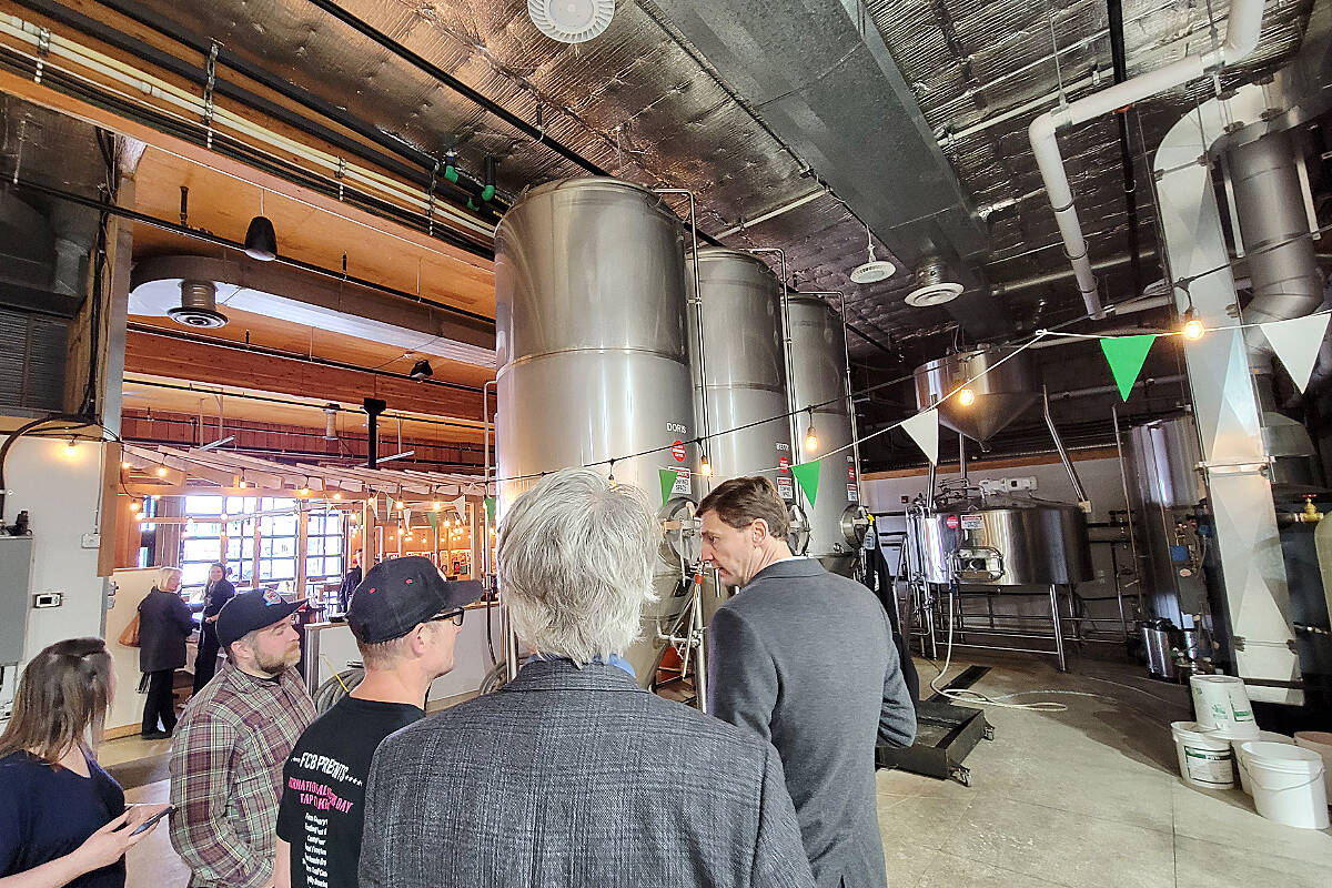Premier David Ebys tour of Langley City businesses on Saturday, April 1, with MLA Andrew Mercier, and Downtown Langley Business Association Executive Director Teri James, included a behind-the-scenes look at Farm Country Brewing. (Dan Ferguson/Langley Advance Times)