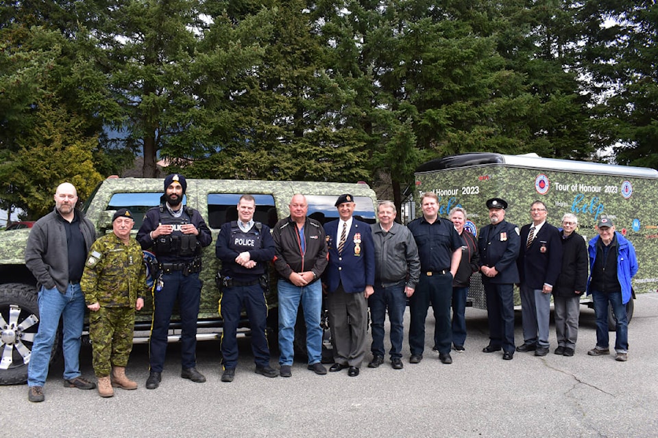 Members of the Hope Legion, Hope RCMP, and Hope Fire Department pose with those traveling with the ‘Tour of Honour’ and with Honour House Society members, including Hon. Col. Al De Genova (second from l). (Photo credit: Kemone Moodley/Hope Standard)