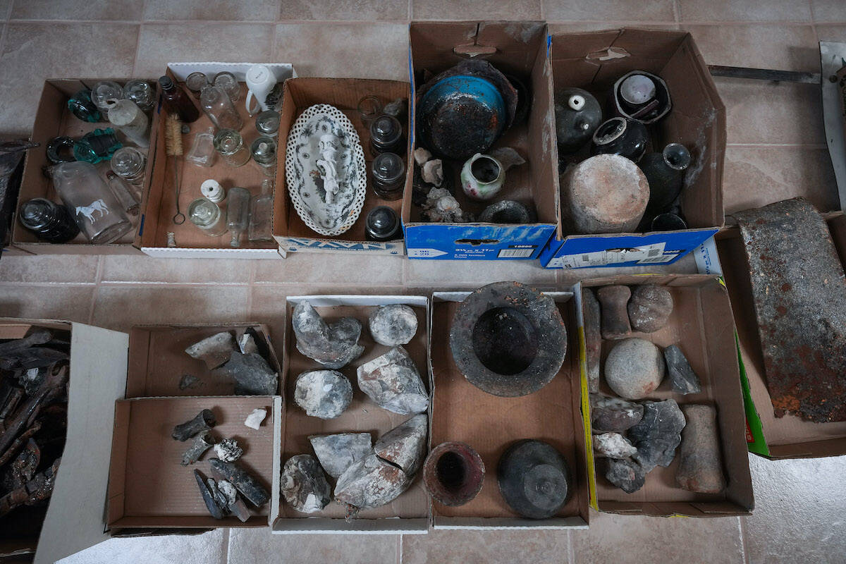 Items salvaged from the Lytton wildfire debris are seen at the home of Richard Forrest, chair of the Lytton Museum & Archives commission, north of Lytton, B.C., on Wednesday, June 15, 2022. THE CANADIAN PRESS/Darryl Dyck