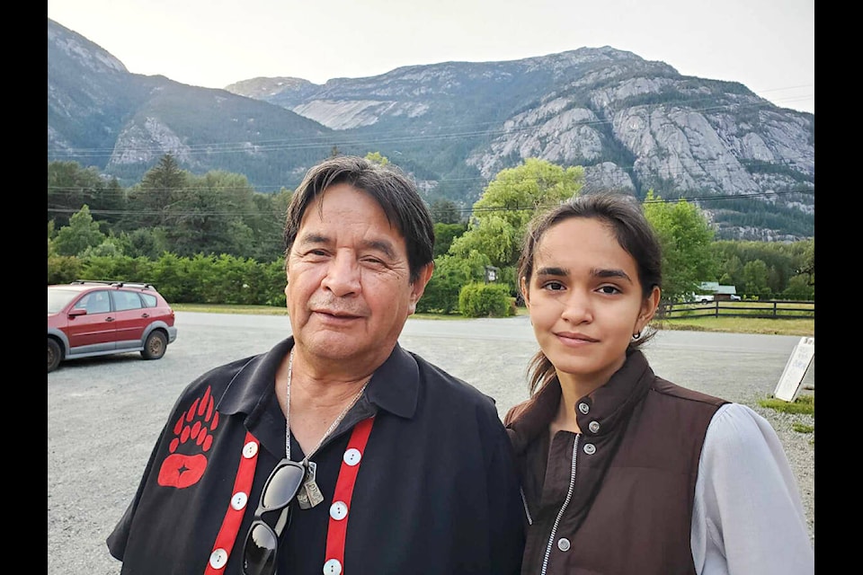 Richard Hall (left) shares some of his experiences from attending residential school in a documentary created by his granddaughter Cadence Hall, 18, that was shown Thursday, June 22 at the second annual Bella Coola Instructional Film Festival. See more page 10. (Monica Lamb-Yorski photo - Williams Lake Tribune)