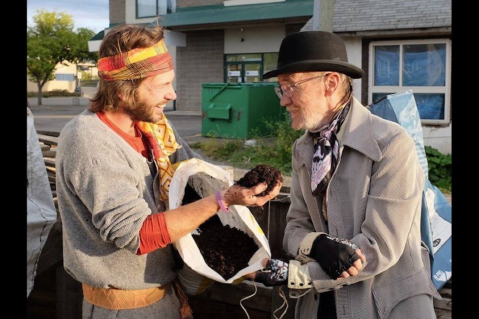 Oliver Berger (L) is the Potato House’s “composteur,” monitoring and processing the compost, which is later donated as soil to community members around Williams Lake. Here he is pictured with Tom Bunn. (Photo submitted).