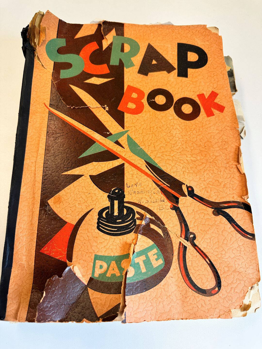 A scrapbook with a Summerland connection was turned in to the Vancouver Police Department. The picture has thee name Lona Washington written on the front. (Photo courtesy of the Vancouver Police Department)
