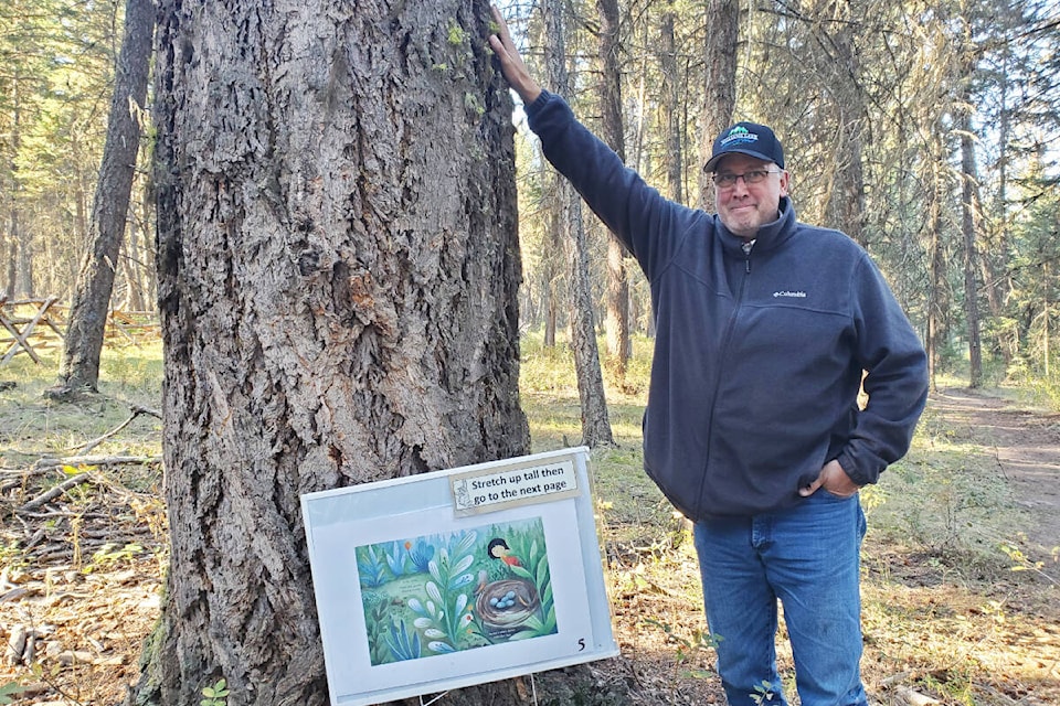 Hugh Flinton obeys one of the signs along the Hydrology Trail in the Williams Lake Community Forest Ne Sextine-Flat Rock block. (Monica Lamb-Yorski photo - Williams Lake Tribune)