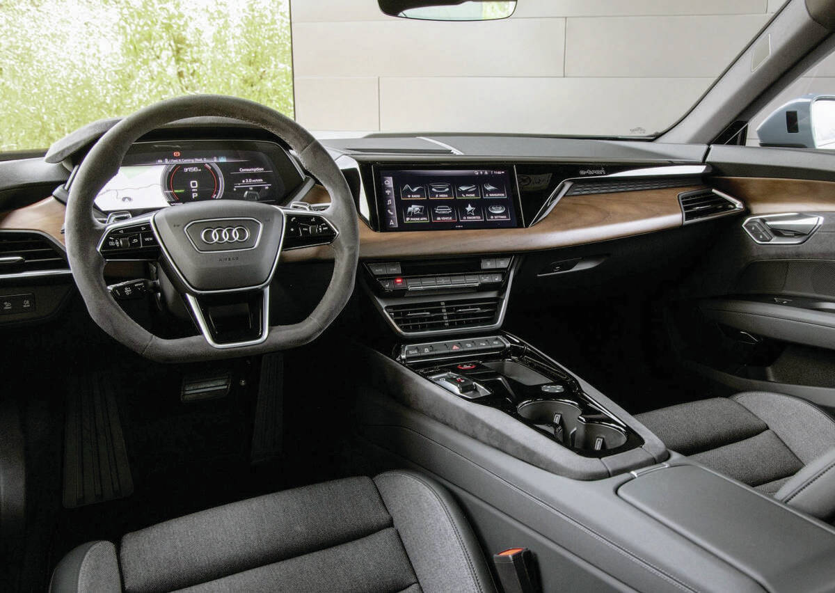 The premium-look dashboard has a configurable 12-3-inch drivers digital instrument display located behind the flat-bottom steering wheel, and beside it theres a straightforward 10.1-inch touch-screen. PHOTO: AUDI