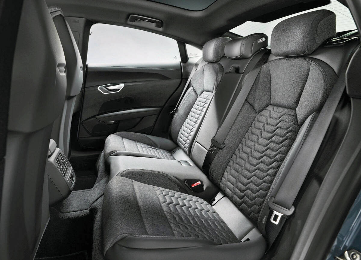 The rear-seat area is easier to enter and exit than the front, but adult-sized passengers will have to scrunch down because of the low roof and ride height. PHOTO: AUDI