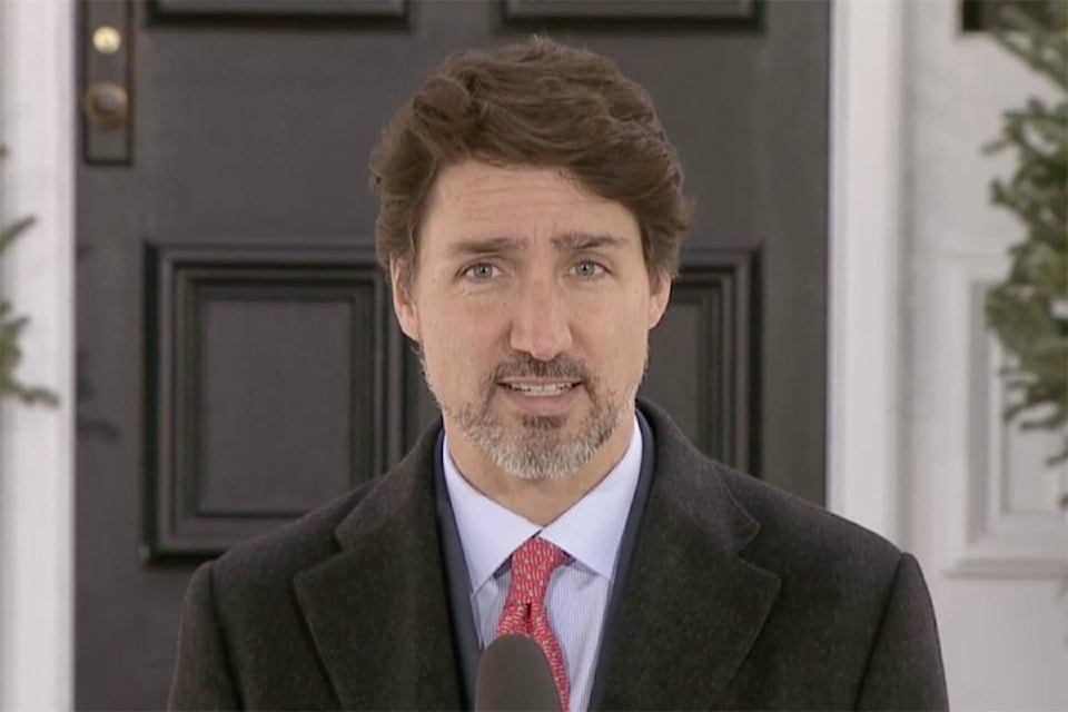 24472949_web1_trudeau-march25