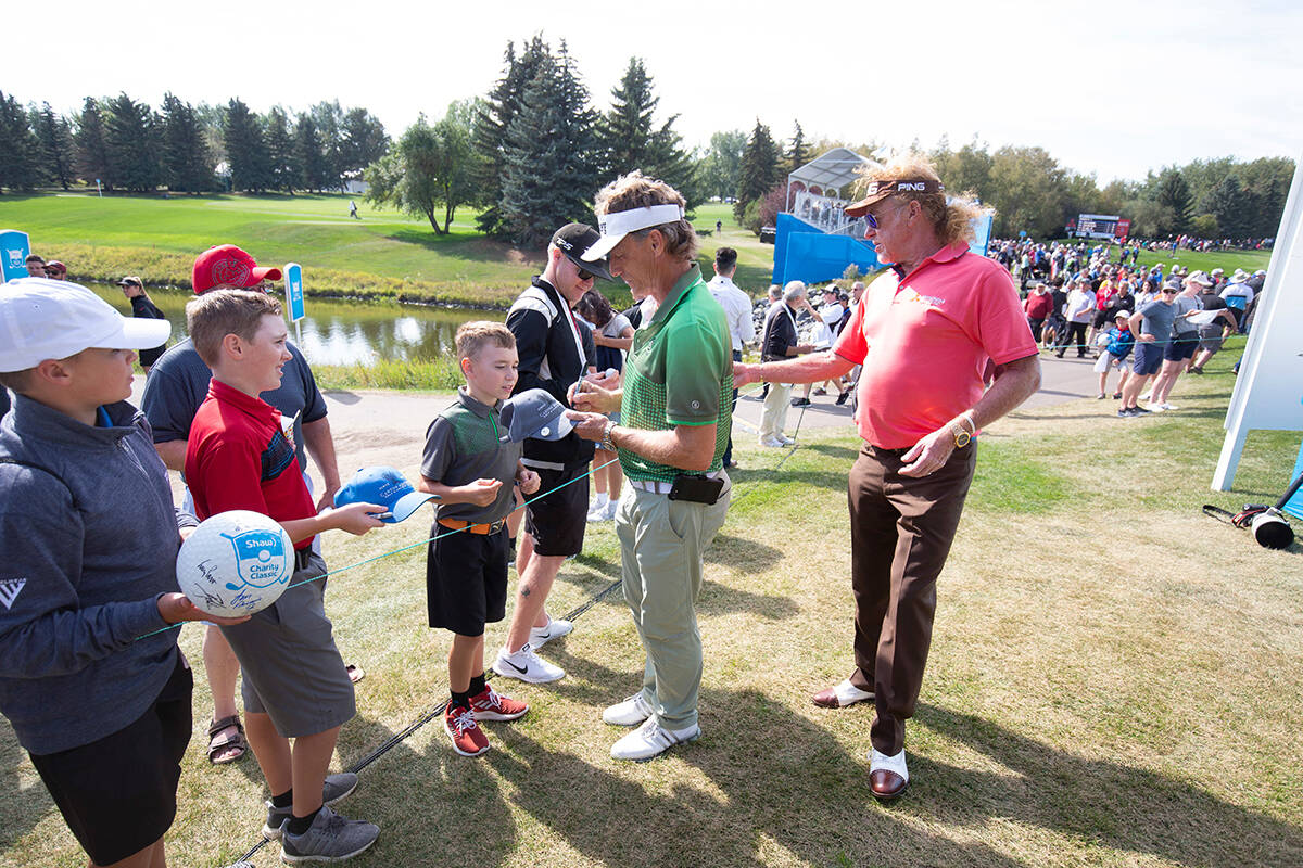 PGA TOUR Champions players Bernhard Langer and Miguel Angel Jiménez interacting with Shaw Charity Classic fans in 2018. Todd Korol/Shaw Charity Classic photo.