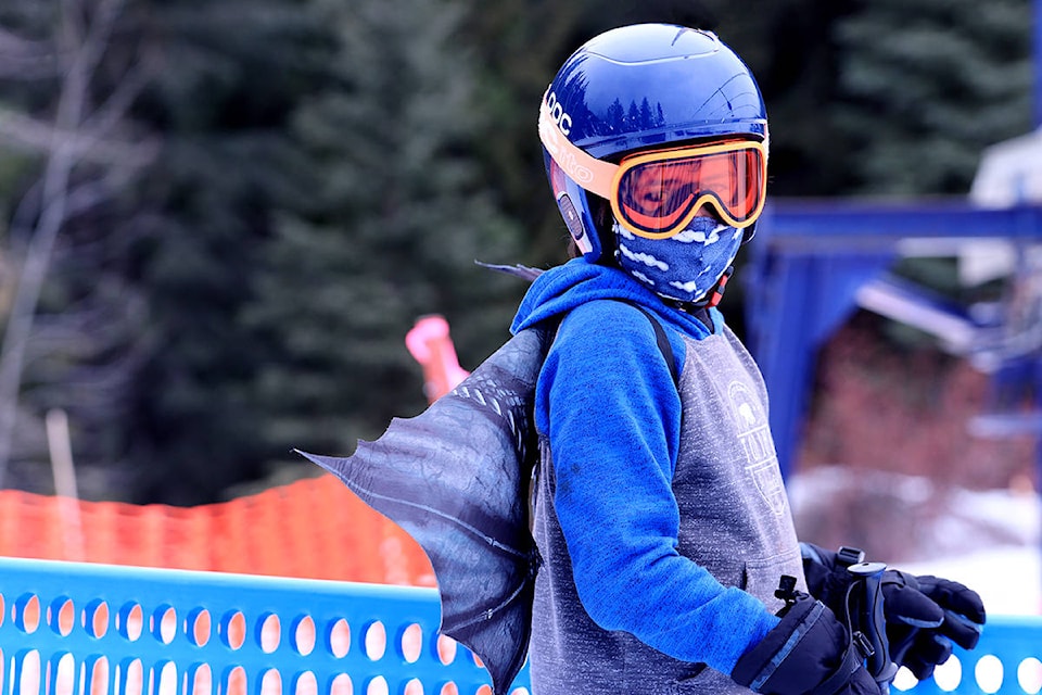 Marcus Graham waits for a trip up Phoenix Mountain’s T-Bar as the 2021 ski and snowboard season wound down Sunday, March 28. Photo: Laurie Tritschler