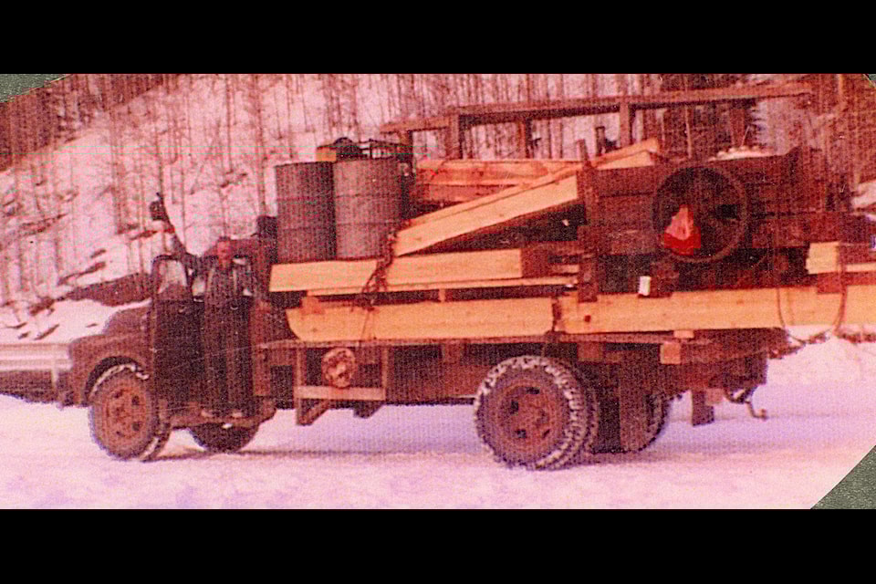 Walter Read hauling his sawmill on the old Fargo truck.