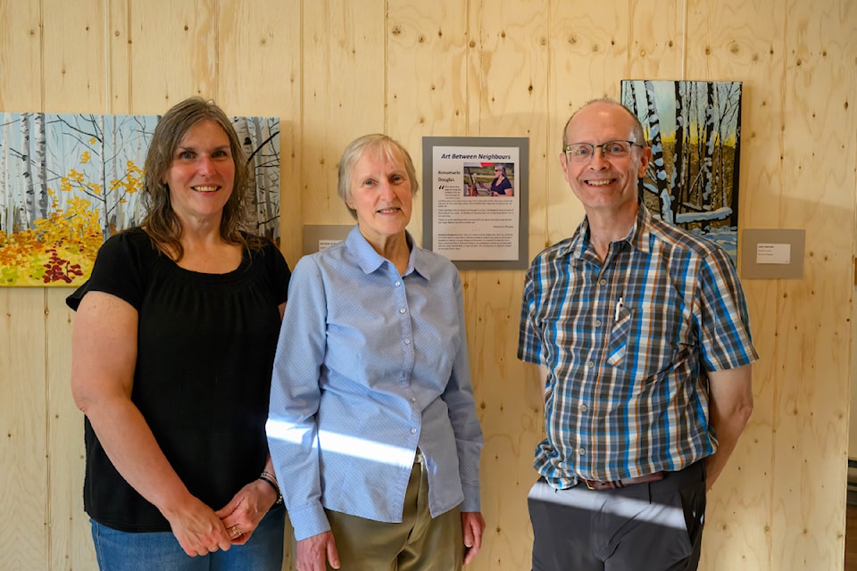 Artists Annamarie Douglas (left) and Hilda Earl (centre) with museum curator and fellow exhibitor Michael Riis-Christianson at Thursday's opening reception.