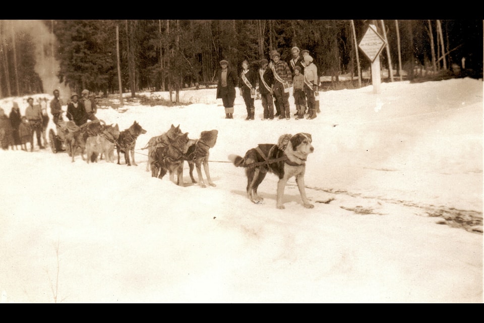 Dogsledder Slim Williams is greeted by residents of Palling in the spring of 1933.